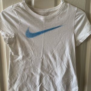 Brand is Nike. White top